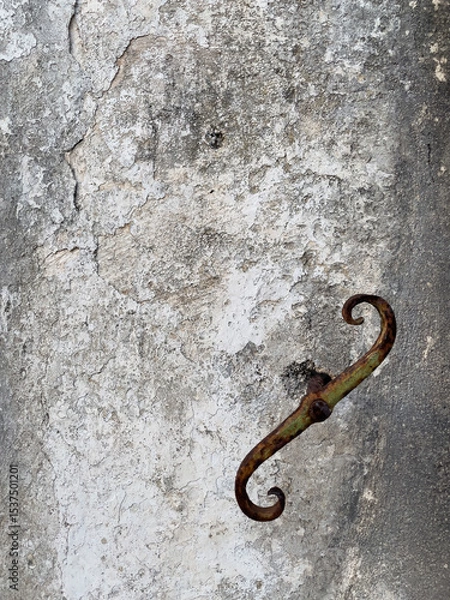 Fototapeta Rusty Hook on Aged Wall Texture
