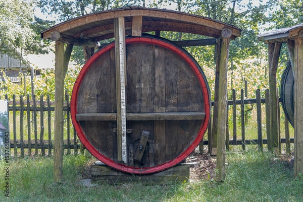 Obraz Old barrel with alcoholic beverage in the countryside