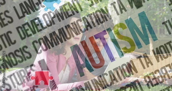 Fototapeta Reading couple in casual outfits leaning over open book in park, with autism overlay graphics