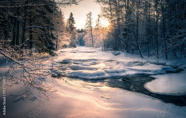 Fototapeta Scenic landscape with flowing river at winter morning