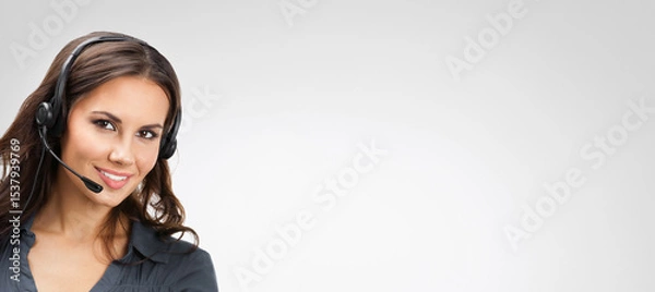 Fototapeta Representative call center. Businesswoman woman support phone operator in headset isolated grey gray background. Callcenter customer service. Sale agent. Video conference. Banner image with free space