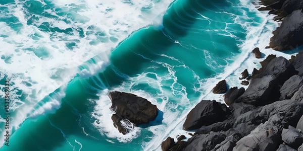 Obraz Aerial View of Waves Crashing on Rocky Coastline

