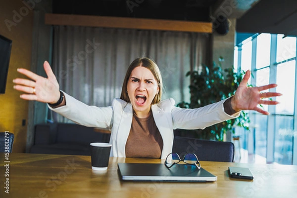 Fototapeta In a modern office, a frustrated businesswoman shares her emotions in a crucial meeting, as tensions rise, showcasing the complexity of corporate dynamics and communication challenges