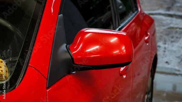 Obraz Red passenger car at the service station.