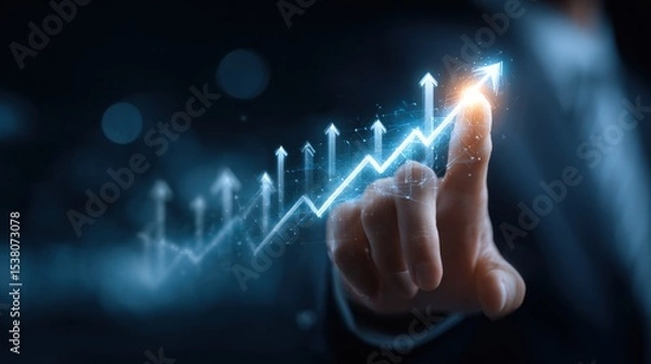 Fototapeta Businessman touching a glowing upward trend graph, symbolizing growth and success.