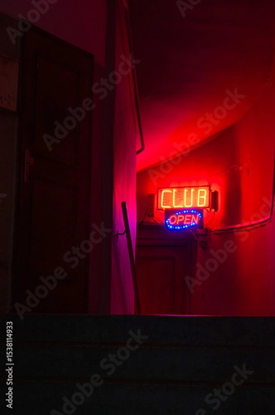 Obraz The interior of a building, entrance with the main staircase leading to the neon sign with the words Club open. Nightlife, entertainment, transgression. Symbolic, mystery, crime, thriller, spy story