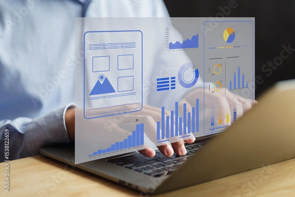 Fototapeta Hands typing on laptop with futuristic data dashboard displaying analytics, graphs, and performance metrics for business intelligence and decision-making.