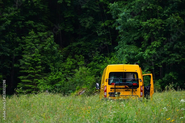 Fototapeta Camper autocaravan on a mountain meadow