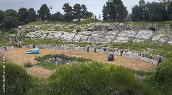 Fototapeta Exploring Siracusa's Ancient Roman Amphitheater on a Quiet Day, Sicily, Italy