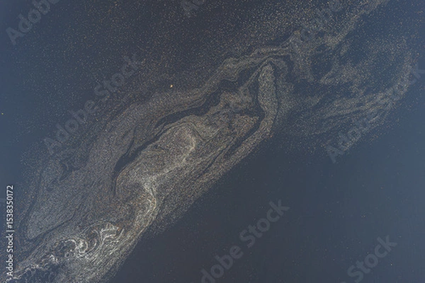 Fototapeta Beautiful foam patterns on water surface in river or sea, aerial drone view