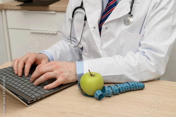 Obraz Diet and weight loss for overweight and obesity. Doctor sitting at desk