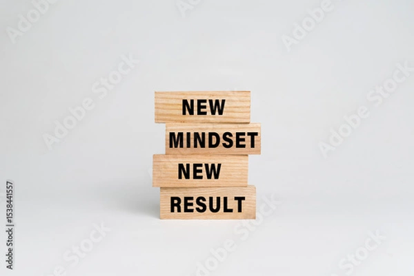 Fototapeta new mindset new result words text on wooden blocks isolated on white background
