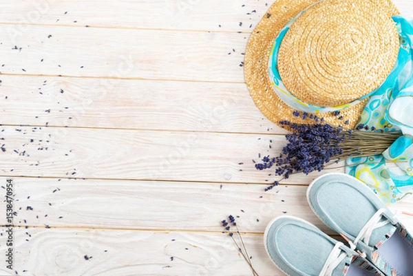 Obraz Straw hat, lavender flovers and  fabric moccasins on white planks vacation planning background flat lay with copy-space