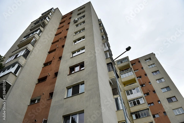 Obraz Perspective view of flat of blocks from Communist period, worn out concrete buildings in Eastern Europe
