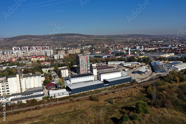 Obraz Factories in suburban industrial area aerial view