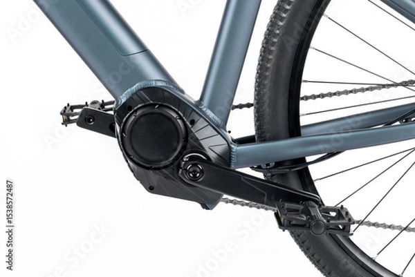 Fototapeta Studio shot of an electric bike's electric motor and pedals in close-up.