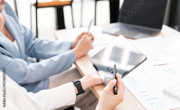 Obraz Business people are meeting for analysis data figures to plan business strategies.