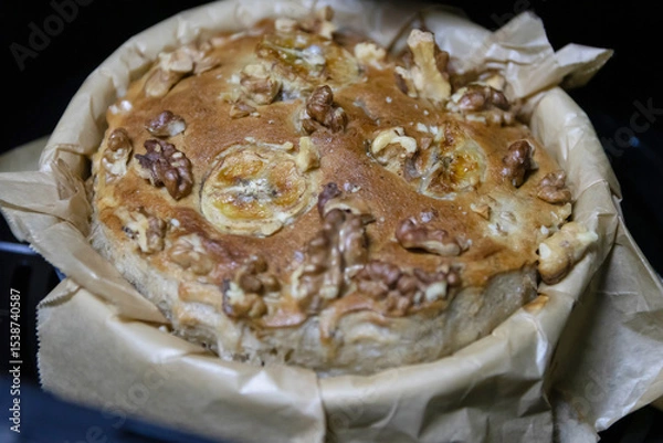 Fototapeta Banana muffins are super fluffy and moist with sliced banana and walnut on top, cooked in the air fryer. Healthy and easy meals from air fryer.