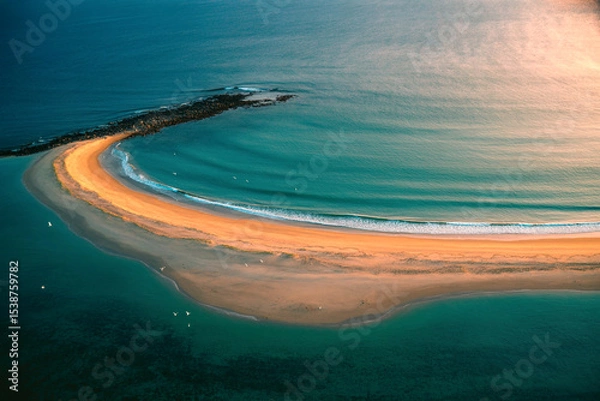 Obraz Aerial View of Oval-Shaped Beach with Turquoise Waters and Golden-Orange