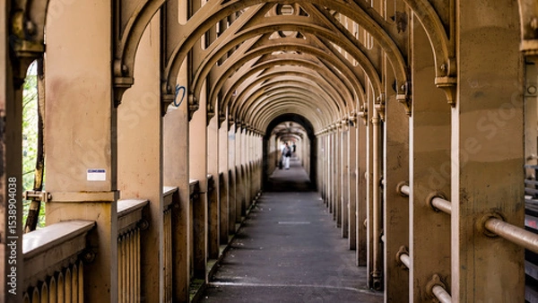 Fototapeta Perspective of a covered walkway disappearing into the distance in Newcastle upon Tyne, England