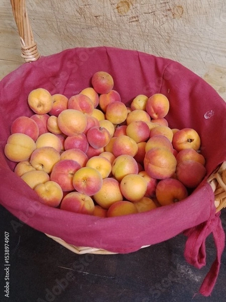 Fototapeta Apricot Fruit in Wicker Basket