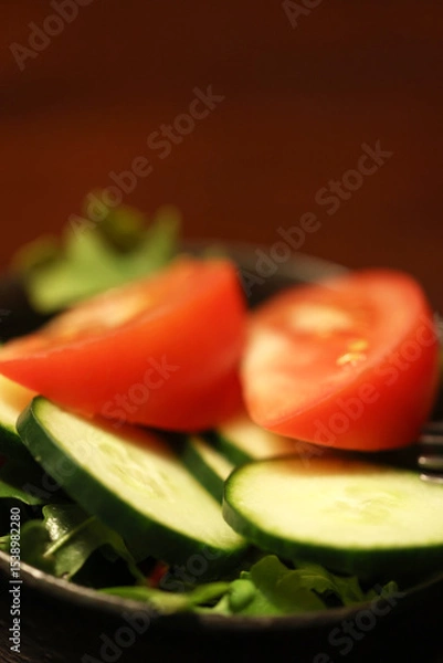 Fototapeta A tomato and cucumber salad.
