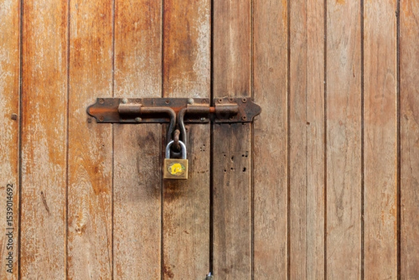 Obraz Rusty door latch with padlock