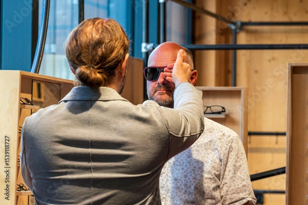 Obraz Happy man with bald head and sun glasses at shop 