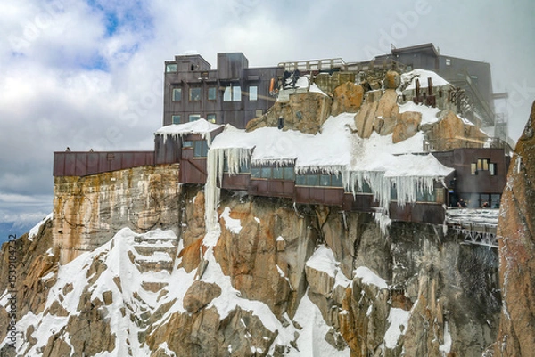 Fototapeta View of Aiguille du Midi mountain station in the Mont Blanc massif in the French Alps. Summit tourist station in foreground. Alps France Europe.	