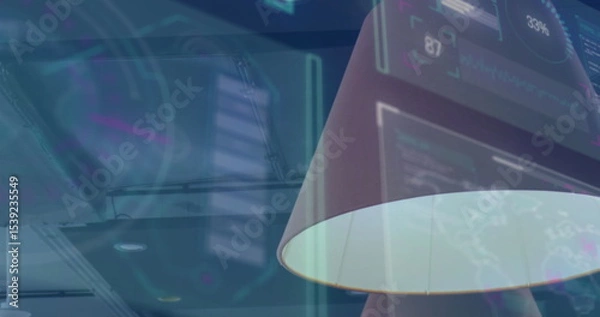 Obraz Highlighting modern angled lamp shade casting glow on digital panels inside tech office, copy space