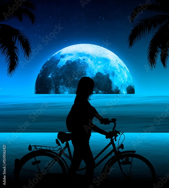 Obraz Una chica viajando en bicicleta en una playa en la noche