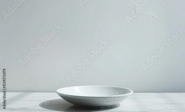 Fototapeta A smooth white canvas of porcelain its delicate texture hinting at the elegance and sophistication it holds Or a sleek ceramic background its glossy surface reflecting light and offering a neutral bac