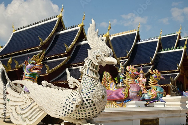Obraz The statues of animals in Thai literature and angels are Thai art that decorate the front of the pagoda at Wat Den Sali Si Mueang Kaen temple. Located at Cheng Mai Province in Thailand.