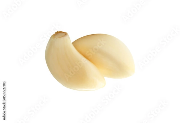 Fototapeta Side view of peeled garlic cloves or pieces in stack isolated with clipping path in png file format