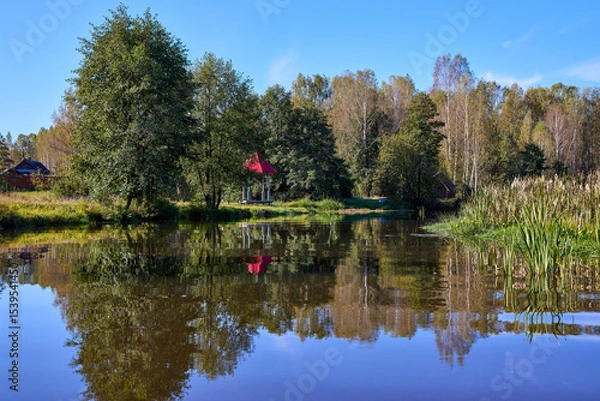 Obraz Tranquil Waterfront Gazebo on Sunny Day
