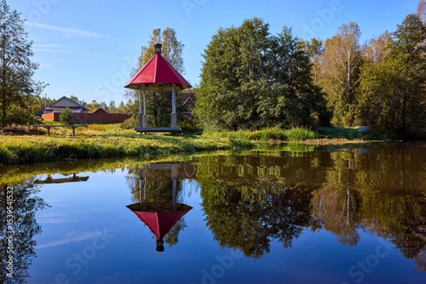 Obraz Tranquil Waterfront Gazebo on Sunny Day