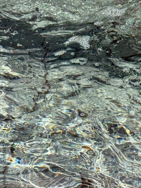 Obraz Flowing and bubbling fountain water surface