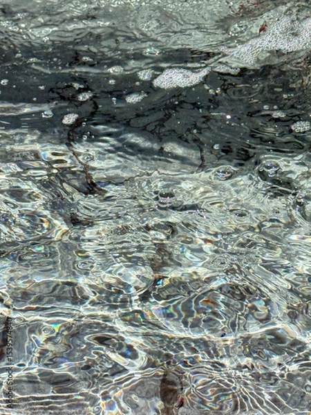 Obraz Flowing and bubbling fountain water surface