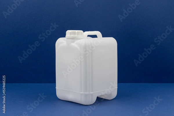 Obraz White Plastic Jerry Can on Blue Background