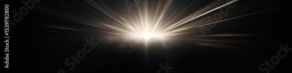 Fototapeta Abstract image of bright light rays emanating from a central point on a black background, creating a dramatic and powerful effect with a sense of energy and focus for graphic resources.