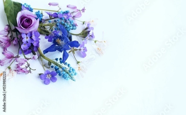Fototapeta A summer bouquet with roses in lilac tones.  A flower arrangement with a place for text.
