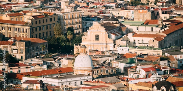 Fototapeta Naples, Italy. Top View Cityscape Skyline With Famous Landmarks In Sunny Day. Many Old Churches And Temples