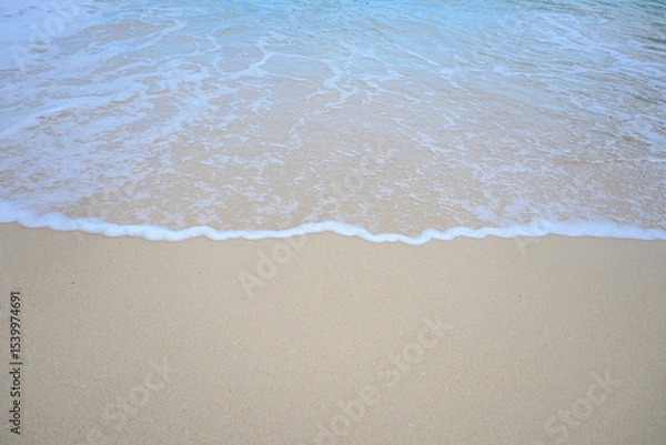 Fototapeta landscape view of beautiful tropical sand beach and sea in sunny day. Beach sea space area, soft focus