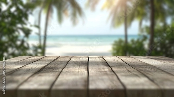 Fototapeta Wooden table sets the scene for a breathtaking tropical beach background. An ideal paradise background for summer product displays, vacation mockups, travel promotions.