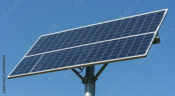 Fototapeta Angled Solar Panel Array Against a Clear Blue Sky