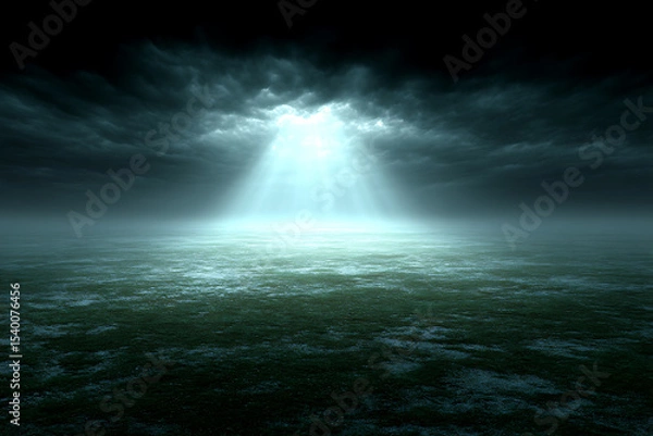 Obraz Dark moody landscape with light beam breaking through storm clouds