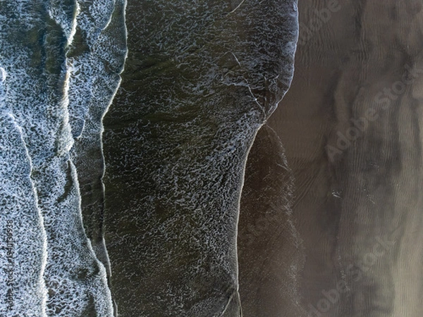 Obraz small waves on long beach seen from above
