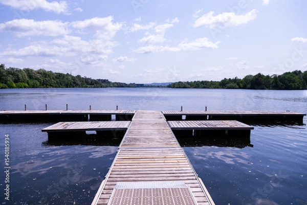 Obraz Empty boat docks on the Lac des Nations (Nations Lake) seen during a sunny late spring morning, Sherbrooke, Québec, Canada