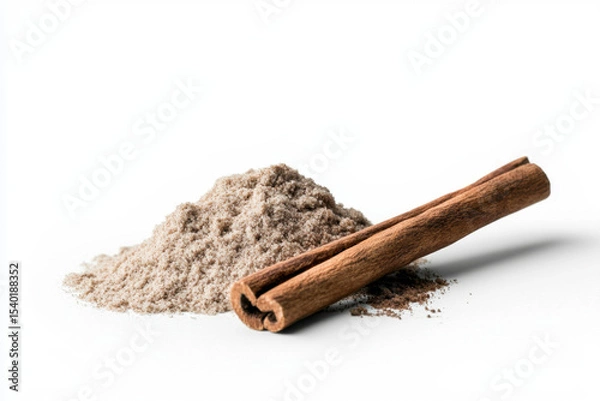 Fototapeta Cinnamon sticks and ground cinnamon heap culinary kitchen food photography minimalist setting close-up spice exploration