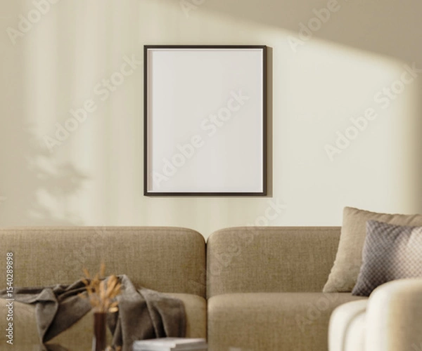 Fototapeta blank poster frame mock up on a wall with sunlightith sunlight above brown sofa with pillows and decor, 3d render